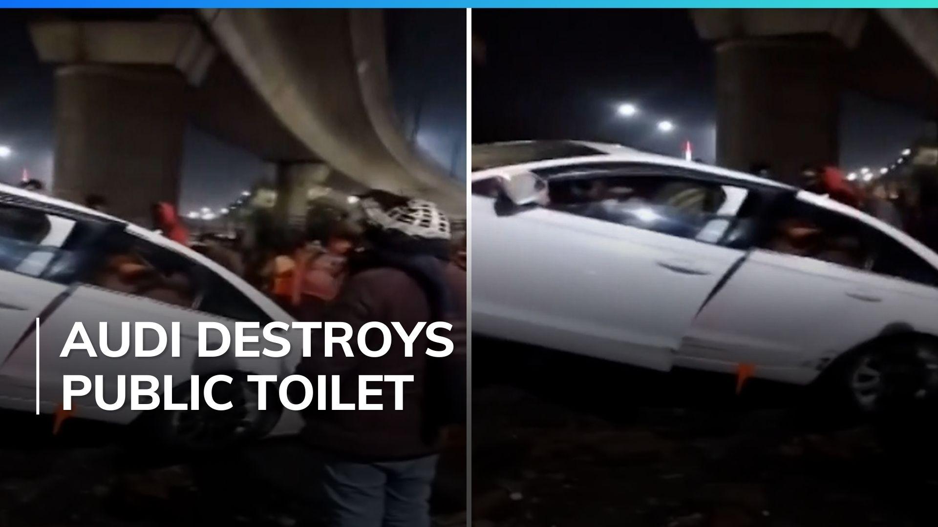 Speeding Audi crashes into a public toilet in Noida | Watch | Editorji